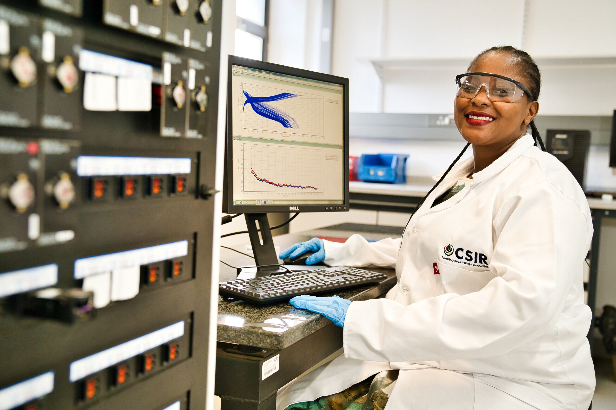 Scientist smiling at a camera