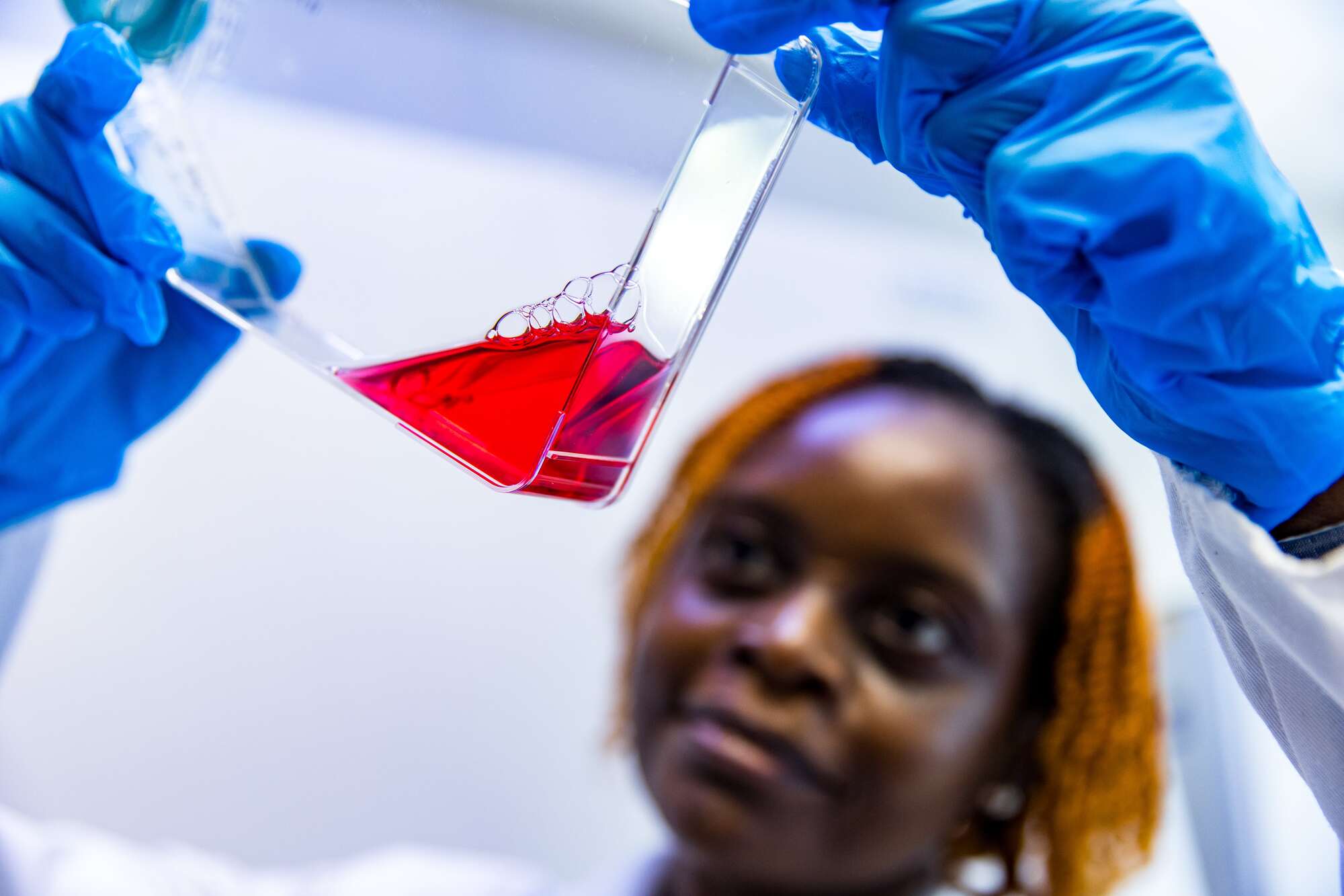 Needle being inserted into person's arm