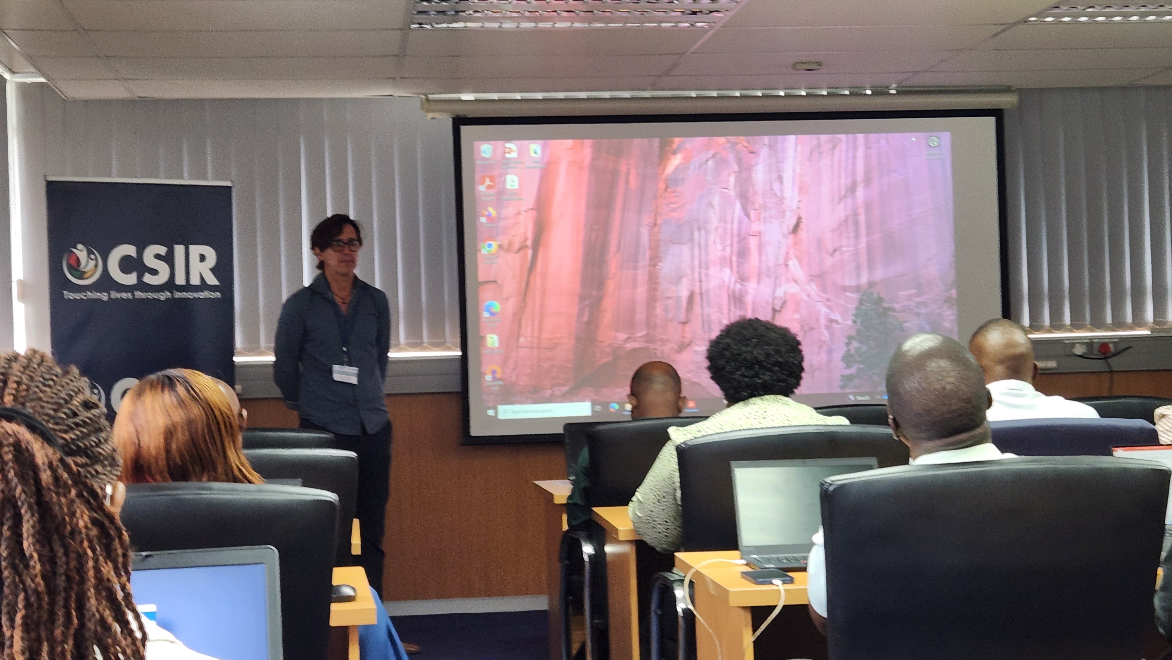 Someone standing in front of people