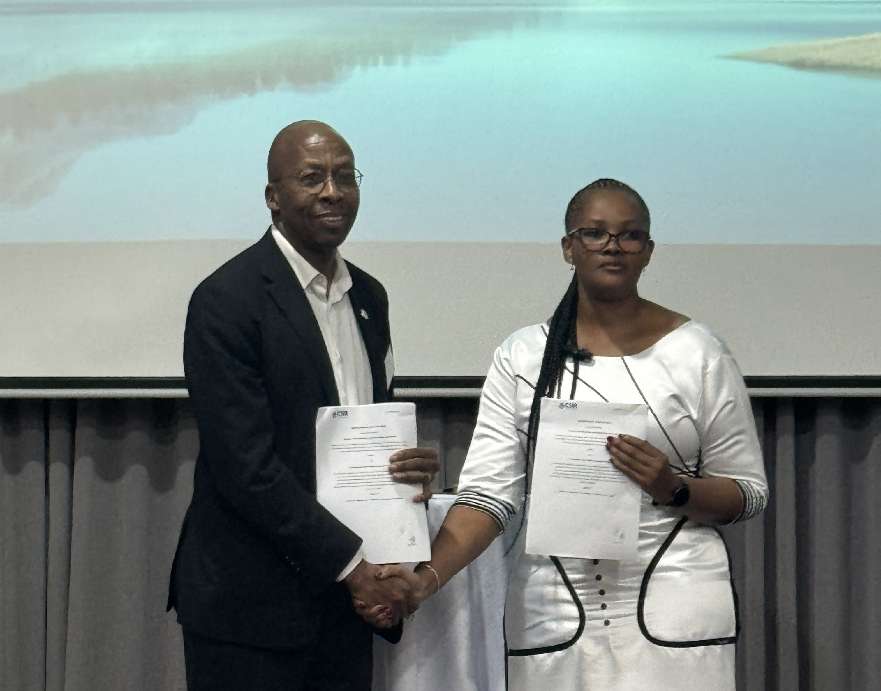 People standing and shaking hands