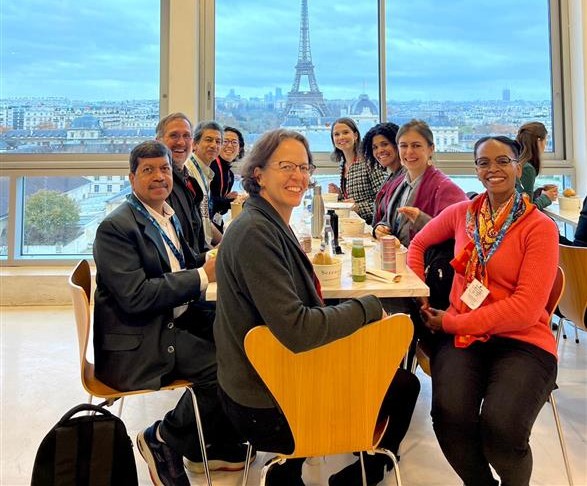 People looking at documents