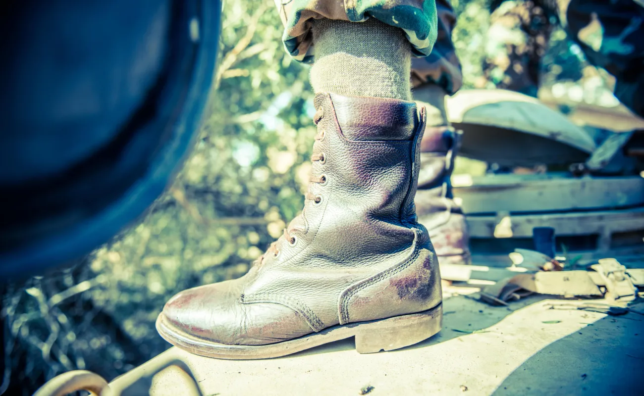 Leather boots on person's feet