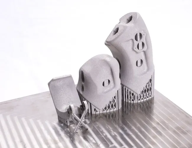 Laser-based manufacturing systems