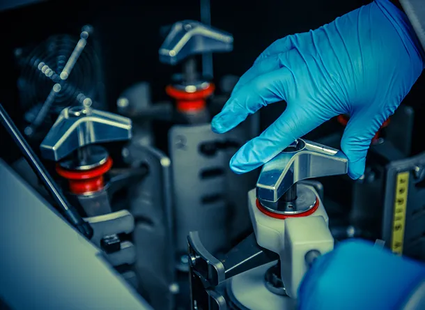 Person turning a knob