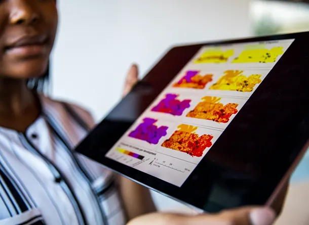 Person holding a tablet