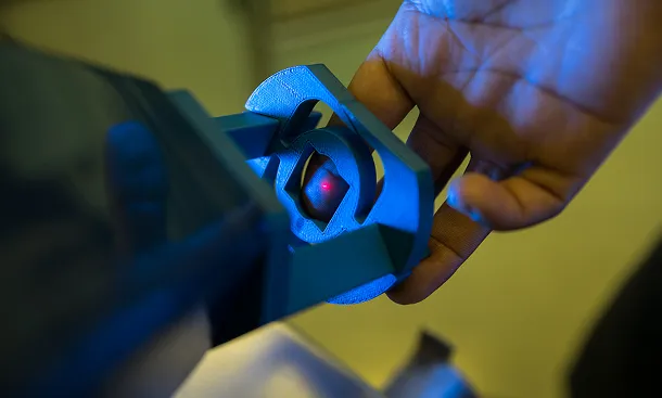 Person's hand on equipment