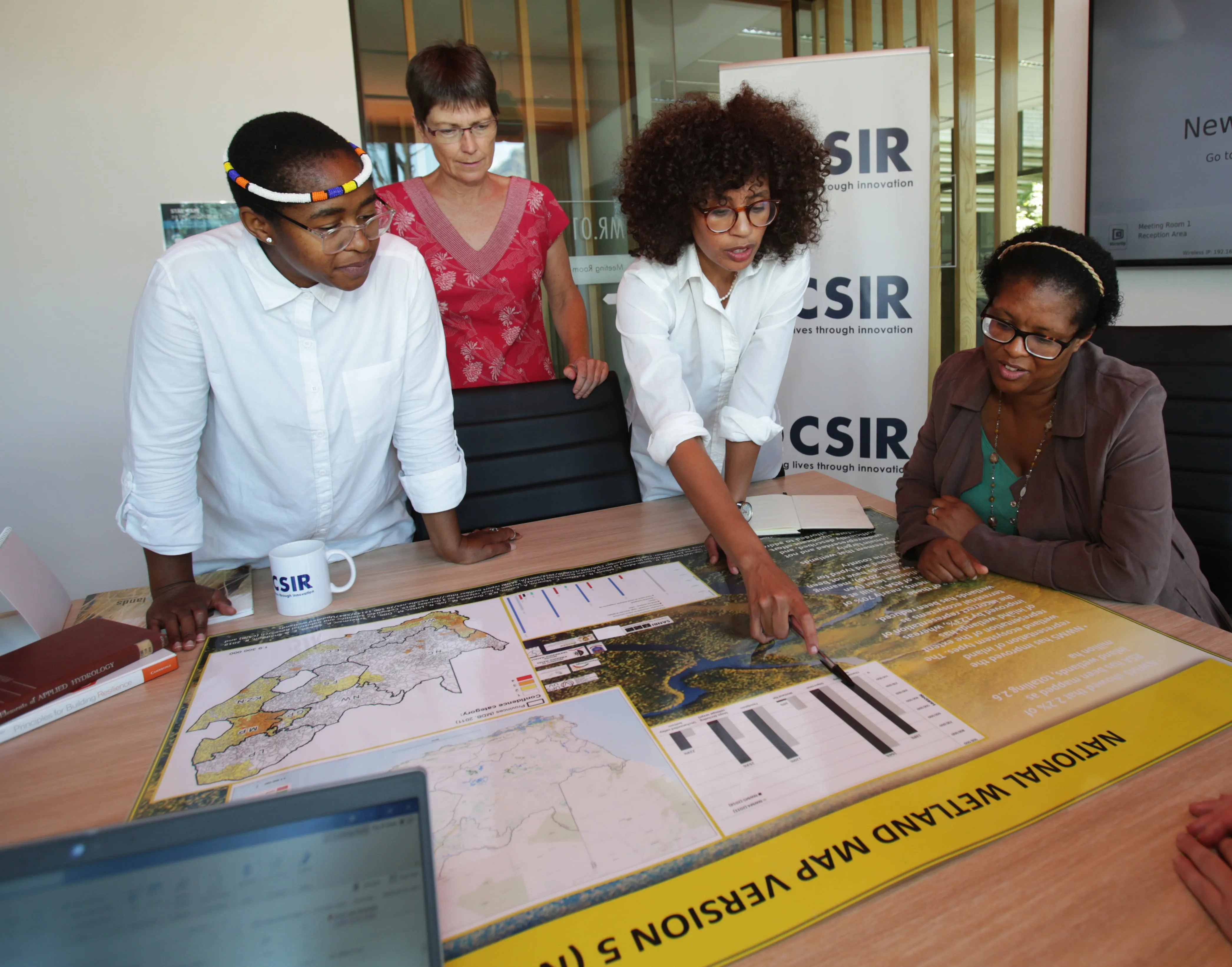 People looking at documents